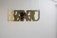 https://salonuldeproiecte.ro/files/gimgs/th-33_13_ Banu Cennetoğlu - BANUBARMIXT, 2013 installation (stainless steel sign, RGB led turning light bulbs).jpg